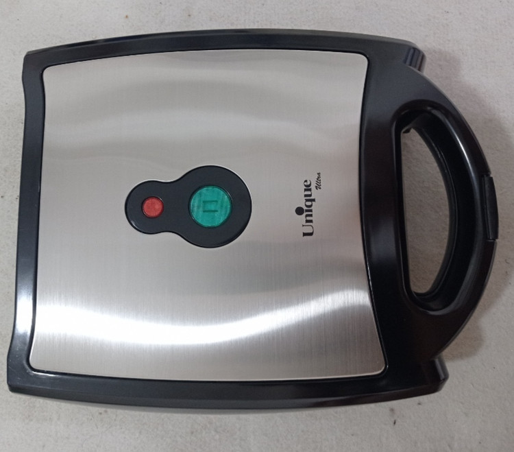 اسنک ساز سه کاره یونیک،دارای سه قالب : اسنک، وافل ، گریل برند : Unnique مدل UA-7002